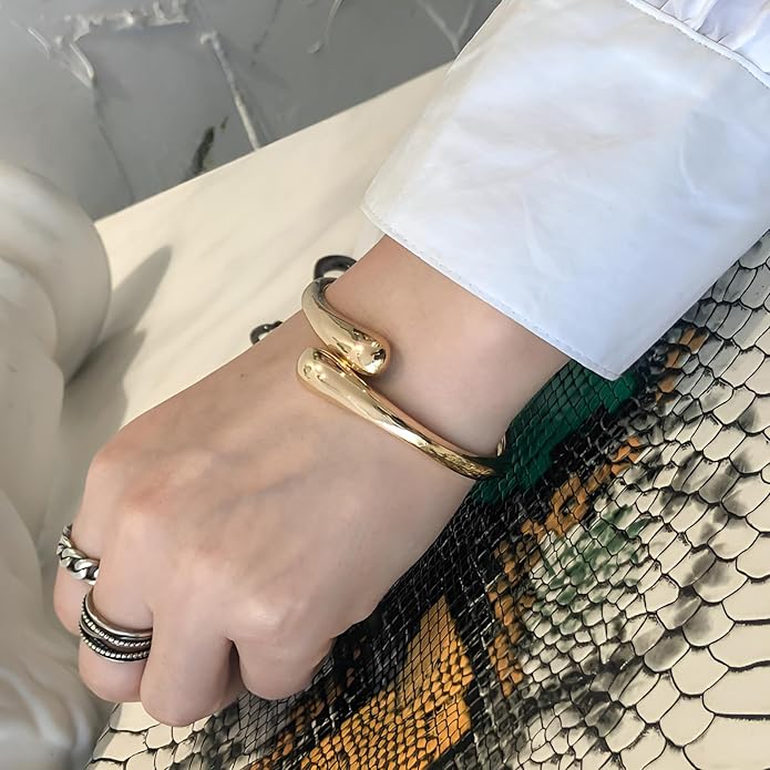 Golden Polished Chunky Twisted Hinged Waterdrop Bangle Bracelet for Women Spiraled Oval Bangle Bracelet